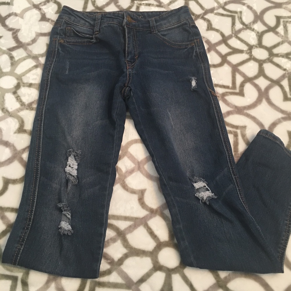 Girls ripped jeans
